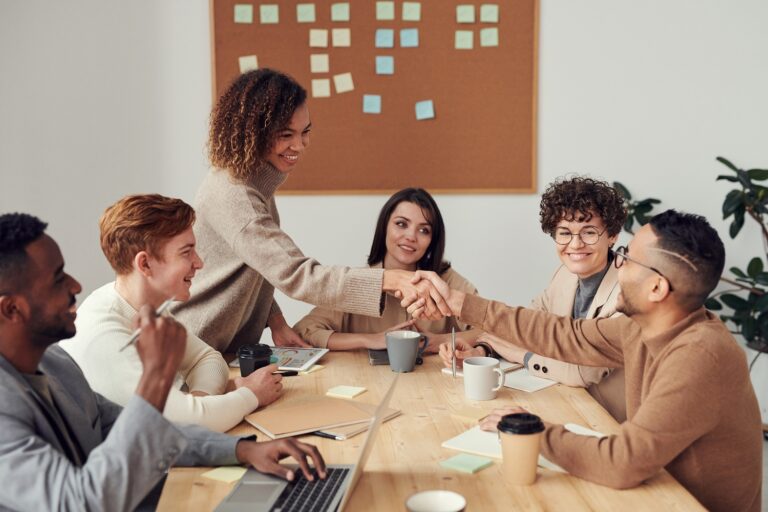 People gathered around office table