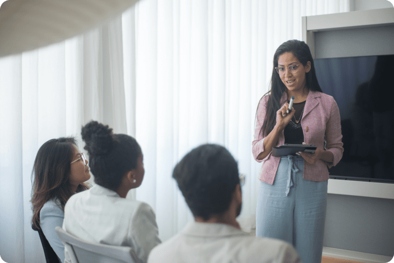 Woman giving a presentation in an office setting